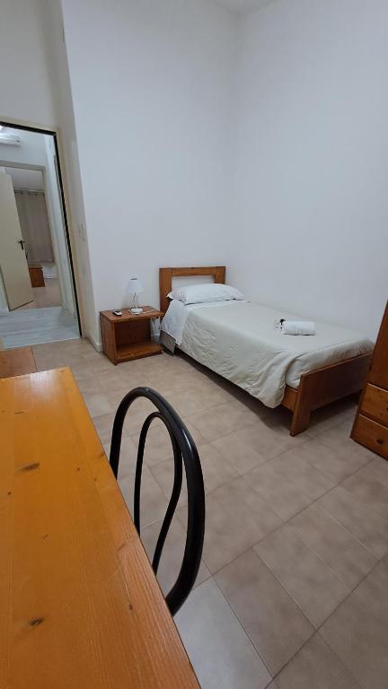 Letto o letti in una camera di Hotel Soleo