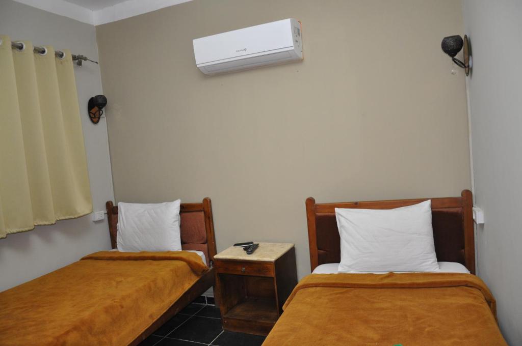 Postel nebo postele na pokoji v ubytování Dahab Plaza Hotel