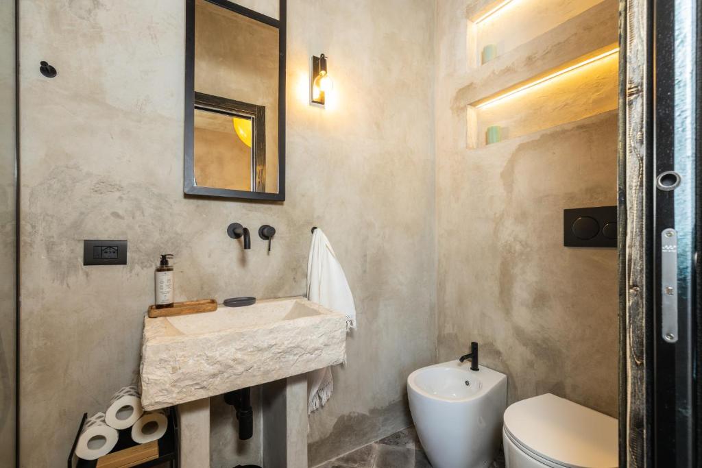 Koupelna v ubytování Via Roma Charming Rooms