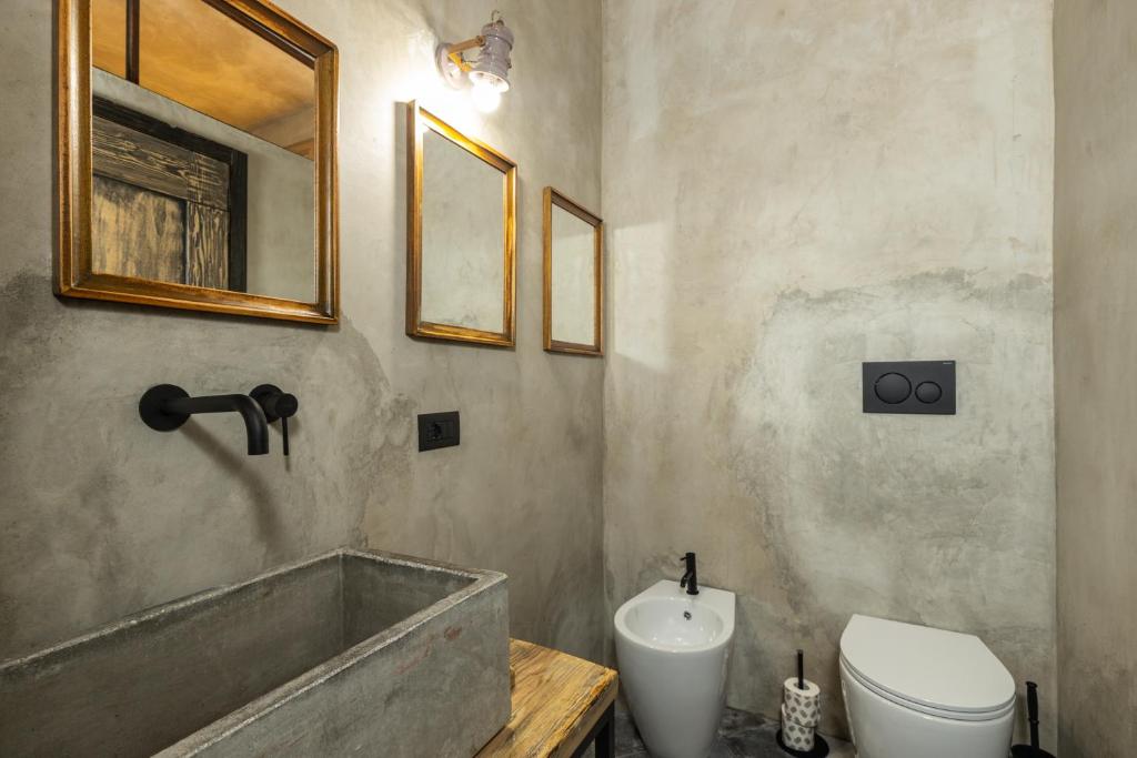 Koupelna v ubytování Via Roma Charming Rooms