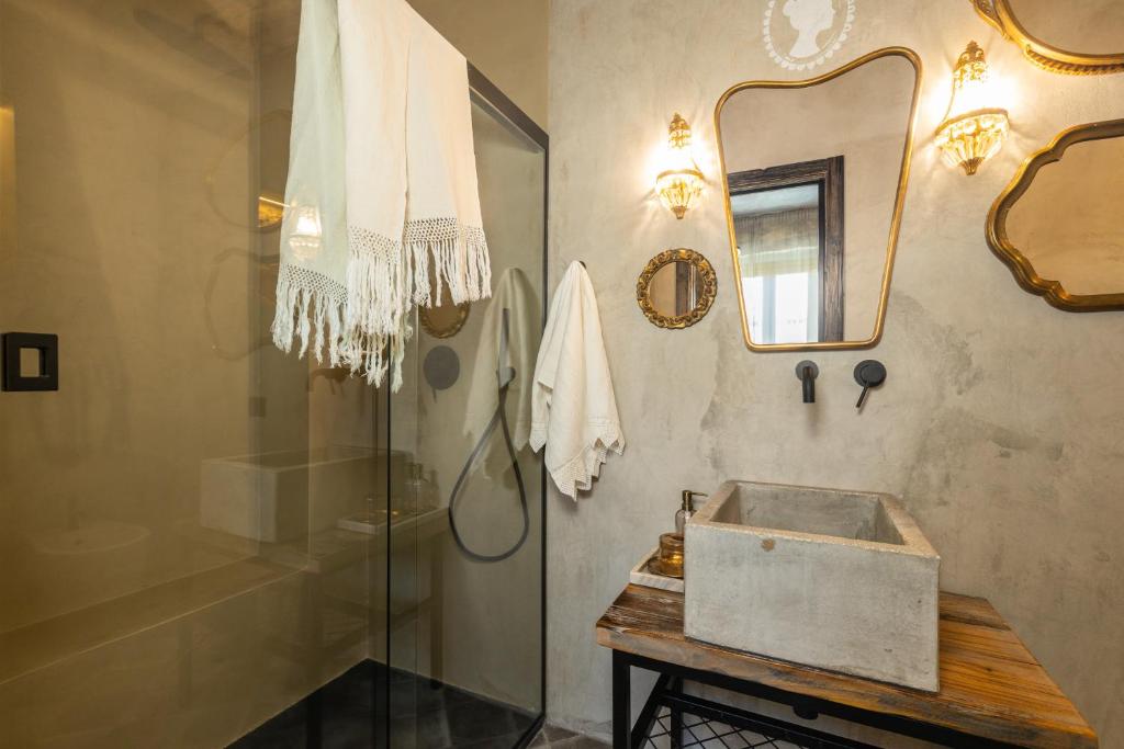 Koupelna v ubytování Via Roma Charming Rooms