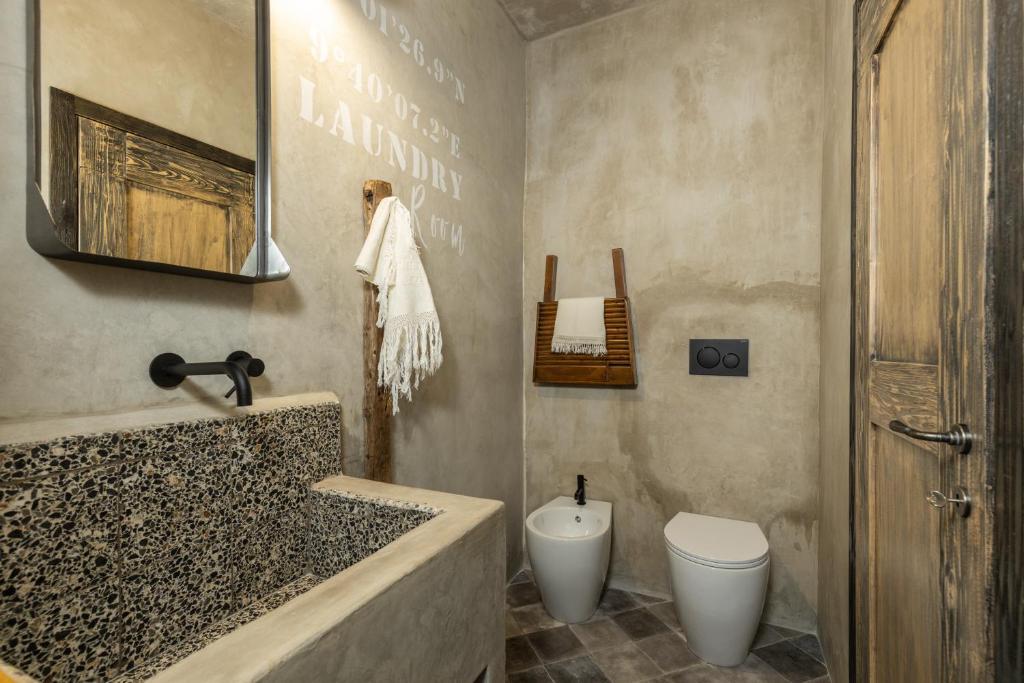 Koupelna v ubytování Via Roma Charming Rooms