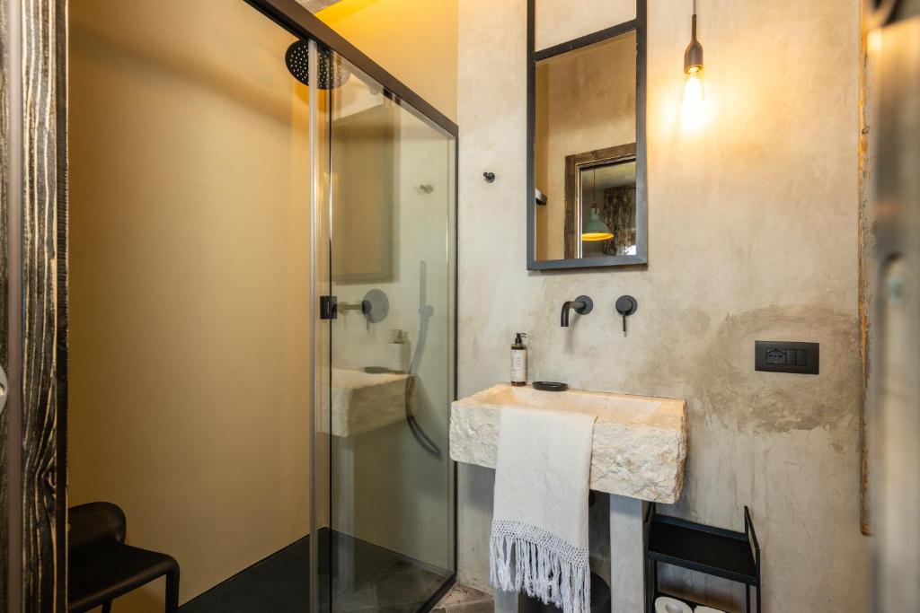 Koupelna v ubytování Via Roma Charming Rooms