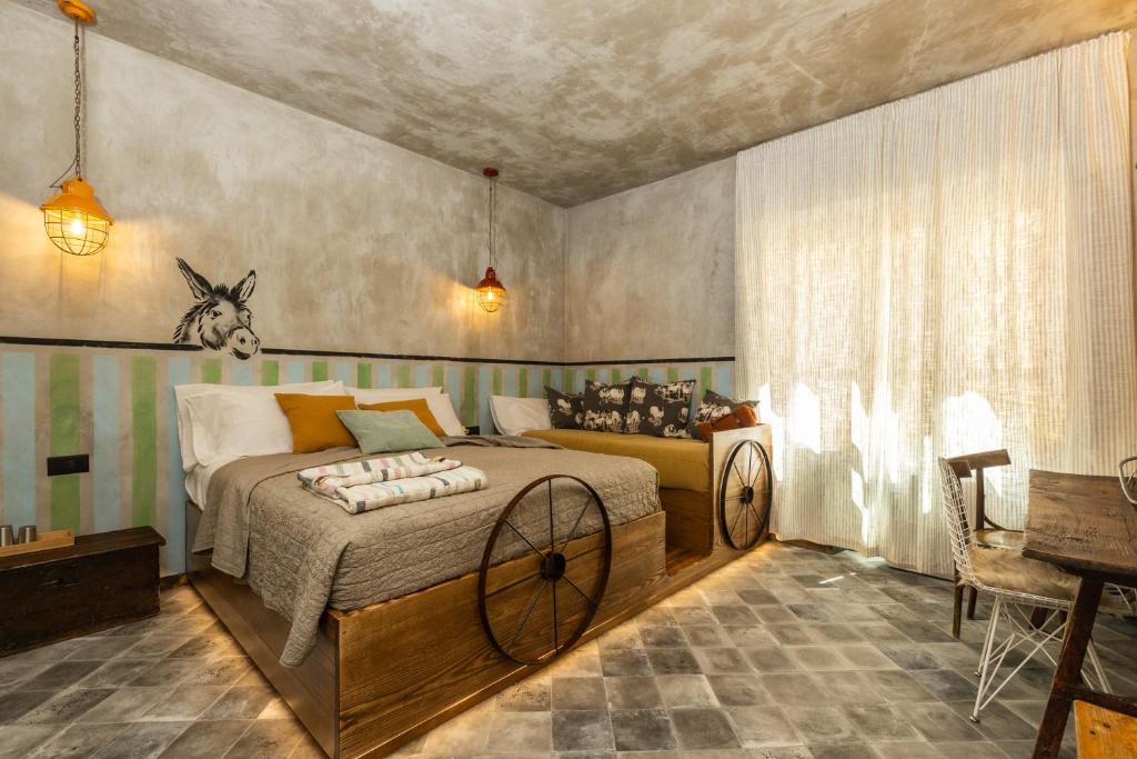 Postel nebo postele na pokoji v ubytování Via Roma Charming Rooms