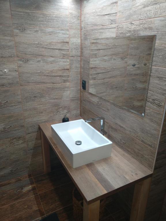 Koupelna v ubytování Apartman pod Svatou Horou