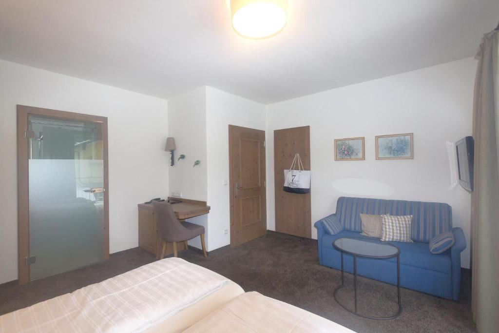 Postel nebo postele na pokoji v ubytování Hotel Stadler am Attersee
