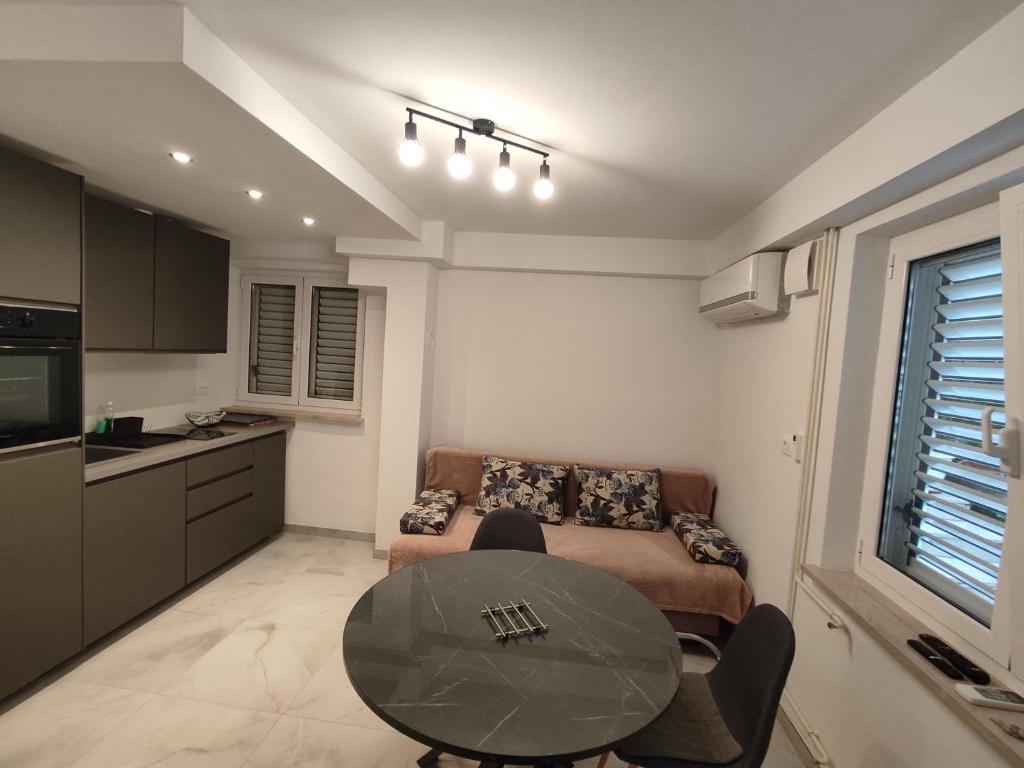 Kuchyň nebo kuchyňský kout v ubytování Apartments Samec