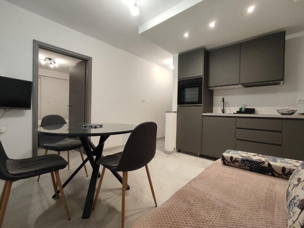 Kuchyň nebo kuchyňský kout v ubytování Apartments Samec