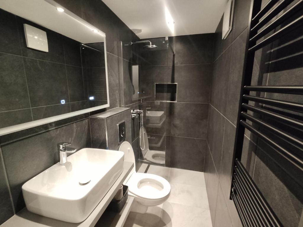 Koupelna v ubytování Apartments Samec