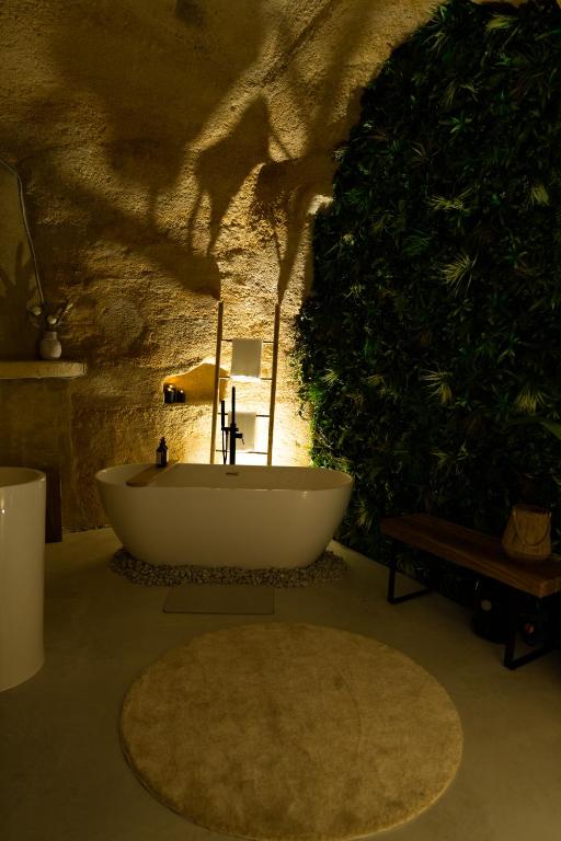 Fotografia z galérie ubytovania Le temps suspendu, Nuit sous la roche & jacuzzi v destinácii Doué-la-Fontaine
