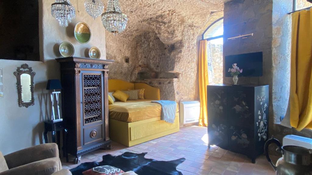 Postel nebo postele na pokoji v ubytování Palazzo storico Colesanti