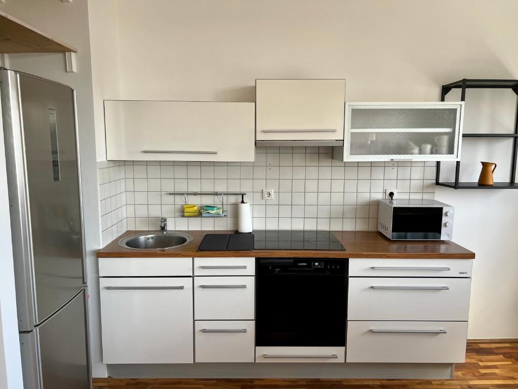 Kuchyň nebo kuchyňský kout v ubytování Condo Casa Di Olivia