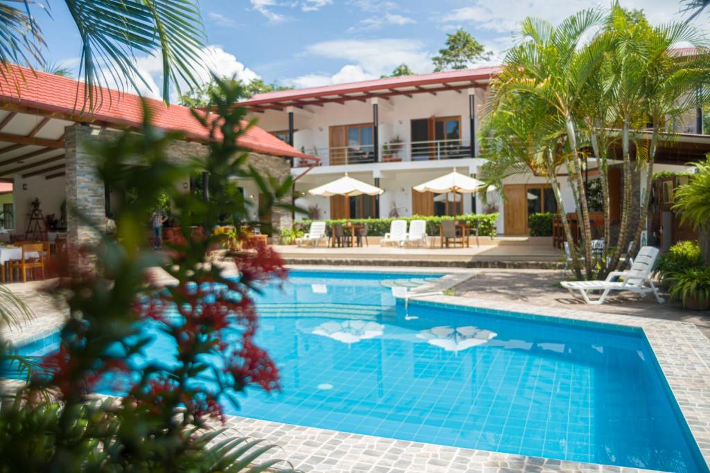 a view of a swimming pool at a resort at Colina de Montalva Casa Hotel in Tarapoto