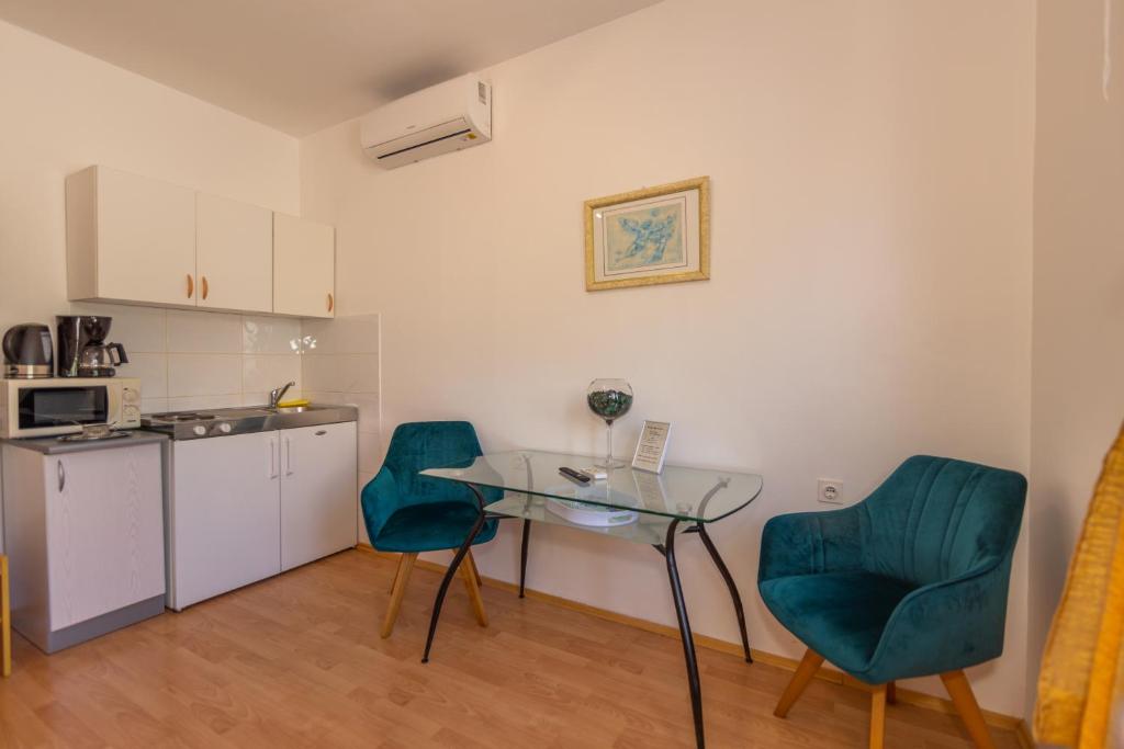 Kuchyň nebo kuchyňský kout v ubytování Matic Apartments
