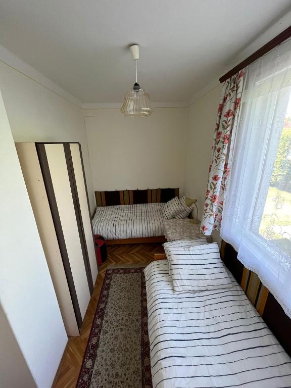 Posteľ alebo postele v izbe v ubytovaní Vitorlás Haus