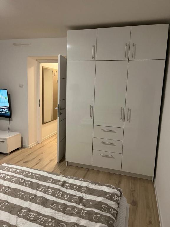 Postel nebo postele na pokoji v ubytování Apartment VBK Osijek