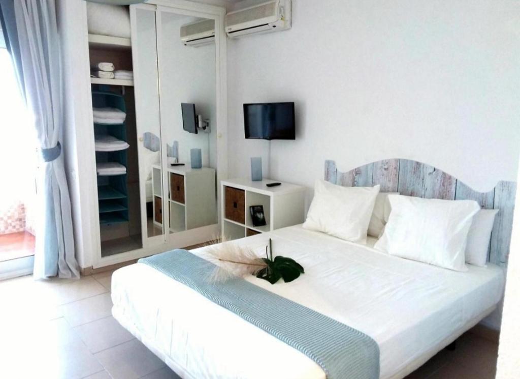 A bed or beds in a room at Brise Marine