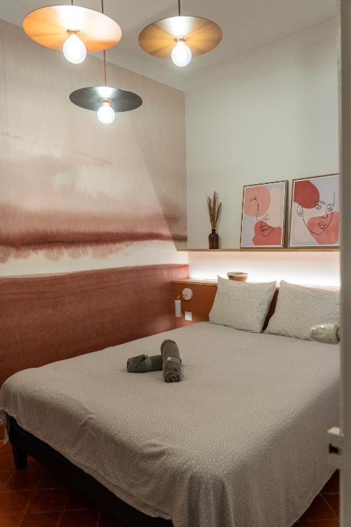 Posteľ alebo postele v izbe v ubytovaní Appartement Haussmannien à Sète