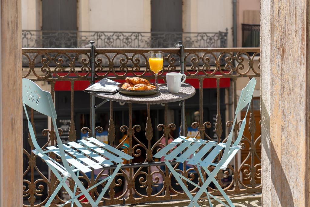 Nápoje v ubytovaní Appartement Haussmannien à Sète