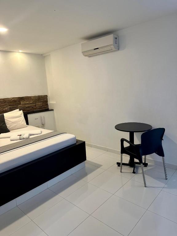 Postel nebo postele na pokoji v ubytování Hotel Paradisus