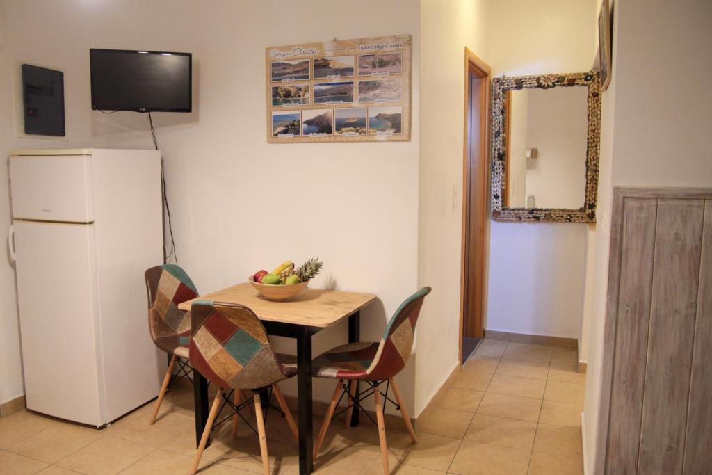 Kuchyň nebo kuchyňský kout v ubytování Christos studios and family apartments