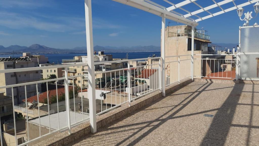 a view from the balcony of a building at Eleni Penthouse Loutraki in Loutraki