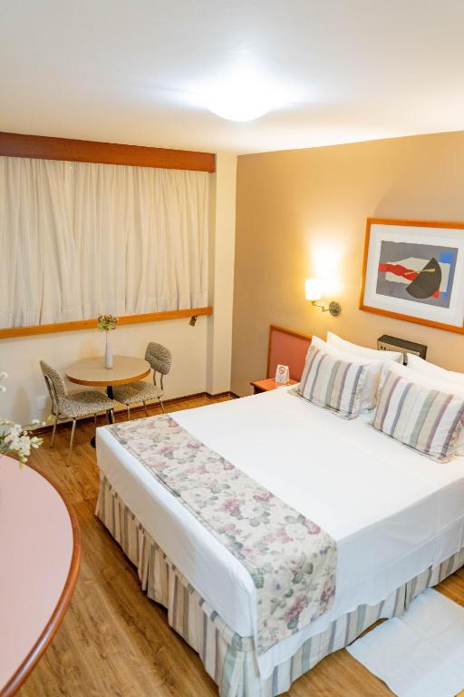 Uma cama ou camas num quarto em Black Stream Hotel