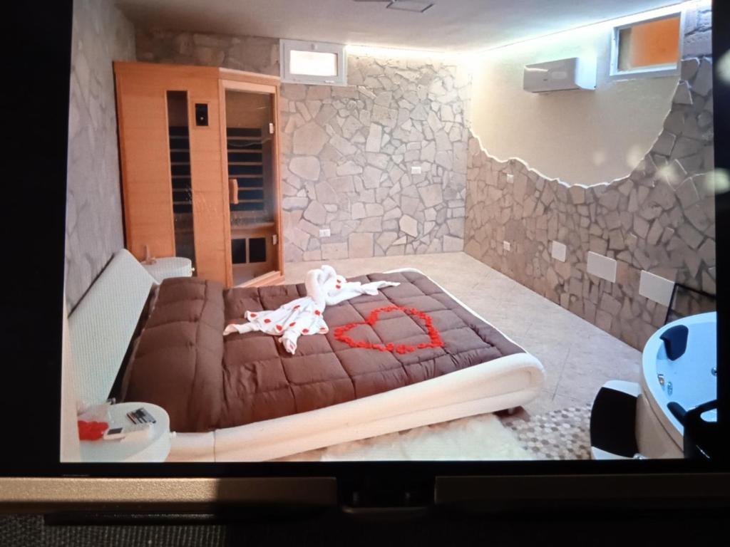 Postel nebo postele na pokoji v ubytování Amos Port-Suite