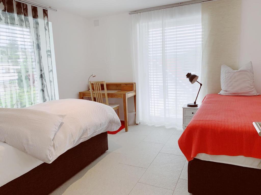 Postel nebo postele na pokoji v ubytování N1 Standalone House Baden