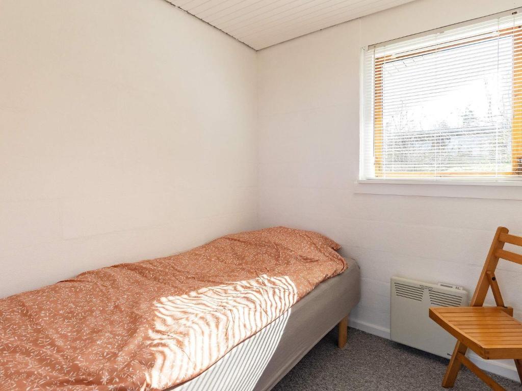 Postel nebo postele na pokoji v ubytování Holiday home Skals VI