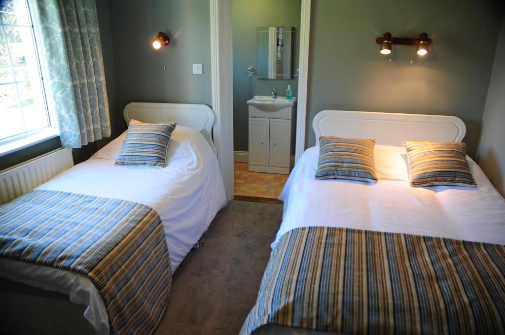 Postel nebo postele na pokoji v ubytování Wayside B&B V93XK6C