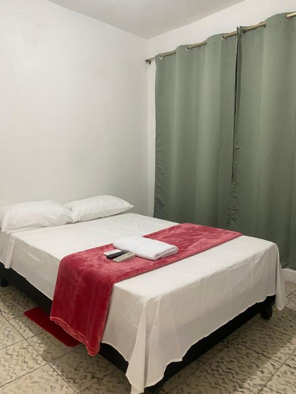 Postel nebo postele na pokoji v ubytování HOSPEDAJE'S HE