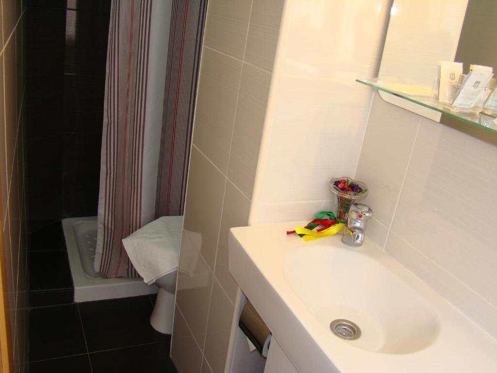 Koupelna v ubytování Hostal Platja