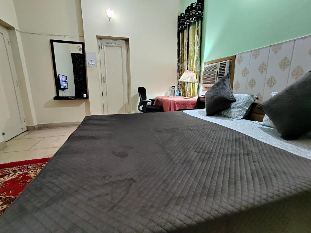 Postel nebo postele na pokoji v ubytování UVs Homestay
