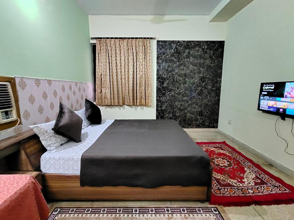 Postel nebo postele na pokoji v ubytování UVs Homestay