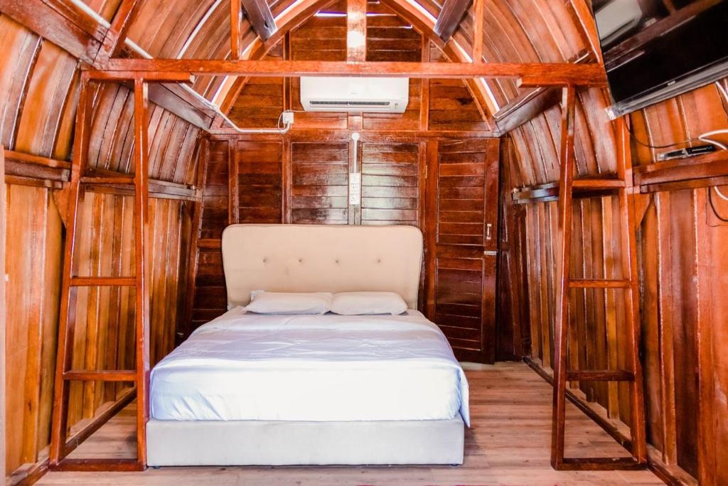Postel nebo postele na pokoji v ubytování As Sufi Villa