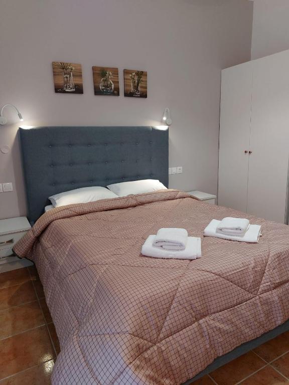 Postel nebo postele na pokoji v ubytování Dolphin Sea View Rooms