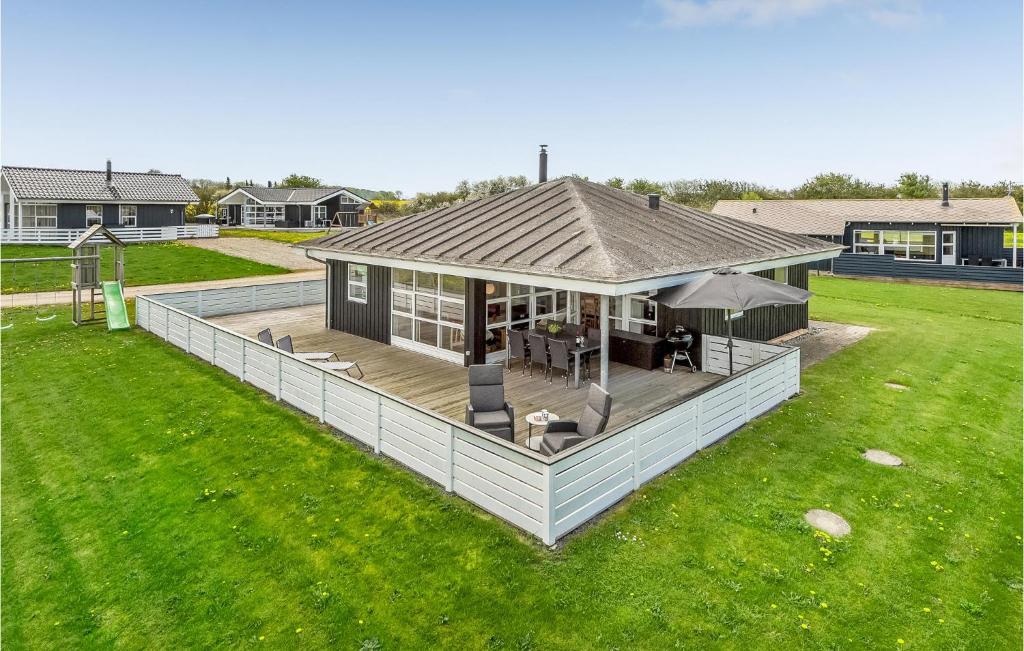 an overhead view of a house with a deck at Three-Bedroom Holiday Home Nordborg With A Room Hot Tub 01 in Nordborg