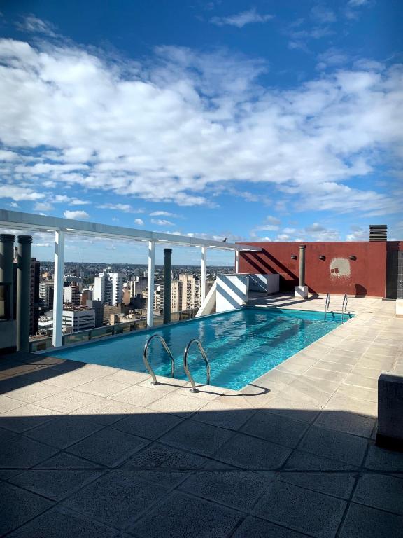 a swimming pool on the roof of a building at SkyHome Córdoba, Terraza y Piscina Panorámica in Córdoba