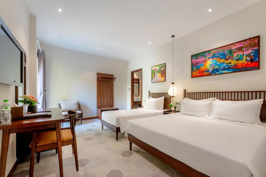 Giường trong phòng chung tại Chillax Old Town Villa