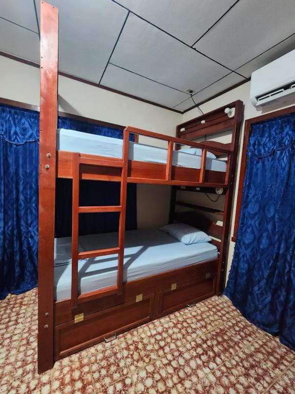 Letto o letti in una camera di Fenix Hotel & Hostel