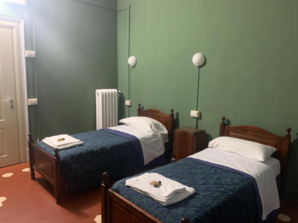 Postel nebo postele na pokoji v ubytování Leon doro