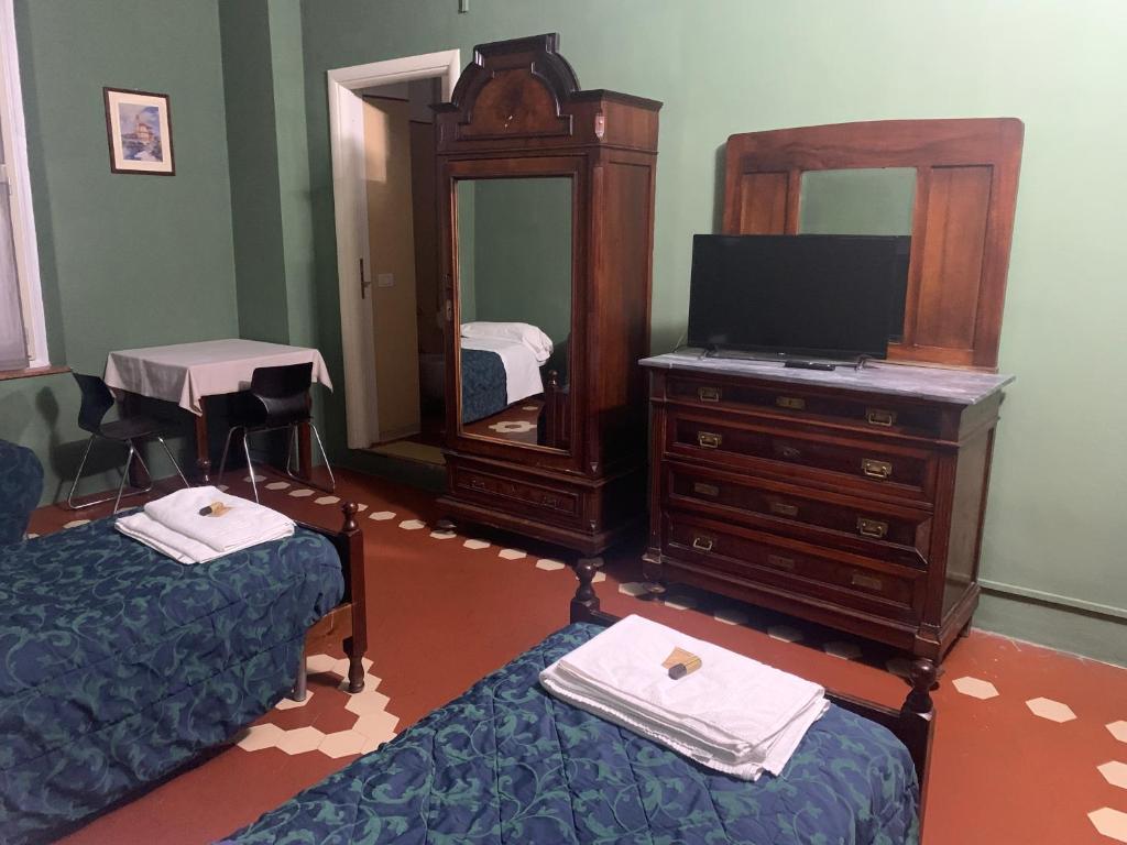 Postel nebo postele na pokoji v ubytování Leon doro