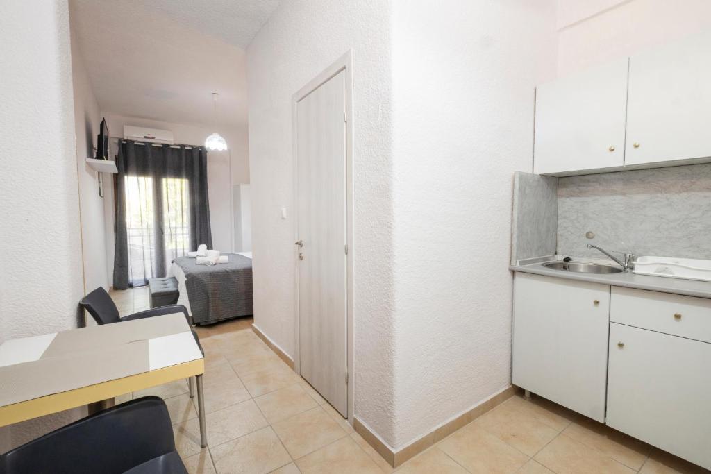 Kuchyň nebo kuchyňský kout v ubytování Alexandra Studios