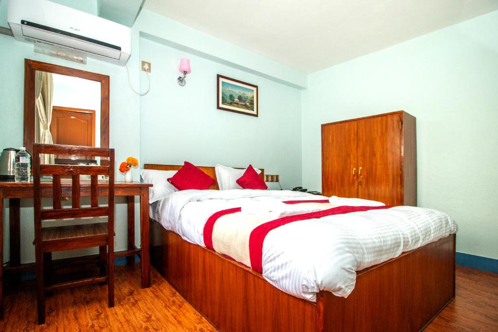 Postel nebo postele na pokoji v ubytování Thamel Eco Home