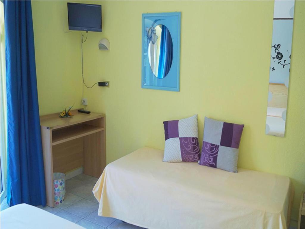 Postel nebo postele na pokoji v ubytování Hotel Stazione