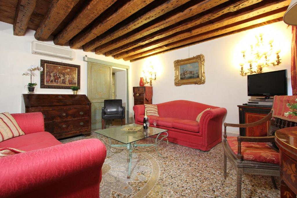 Telewizja i/lub zestaw kina domowego w obiekcie City Apartments Rialto