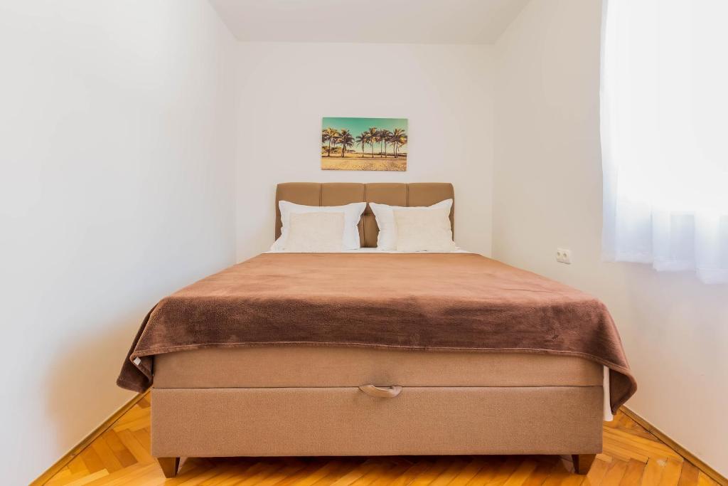 Posteľ alebo postele v izbe v ubytovaní Beach Apartments Croatia