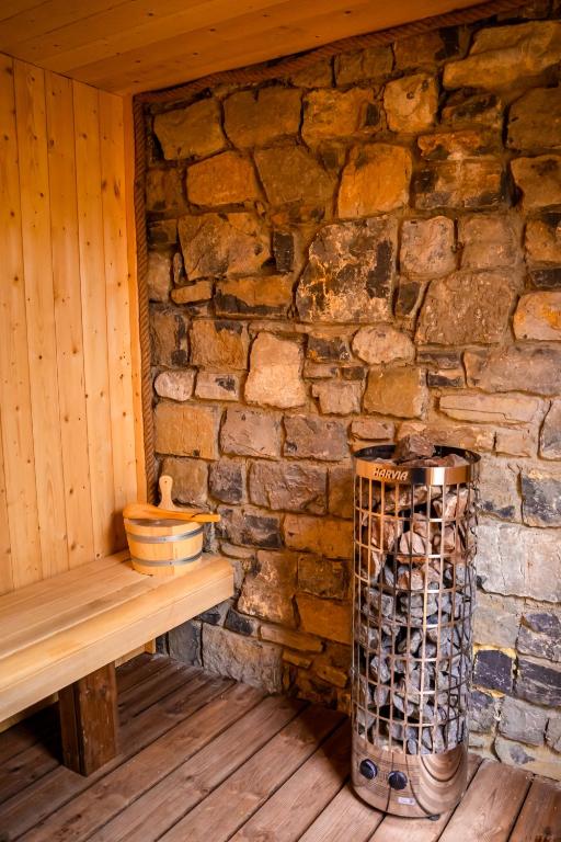 Fotografie z fotogalerie ubytování L'Antre d'Eux - Suite avec sauna et jacuzzi v destinaci Senenne
