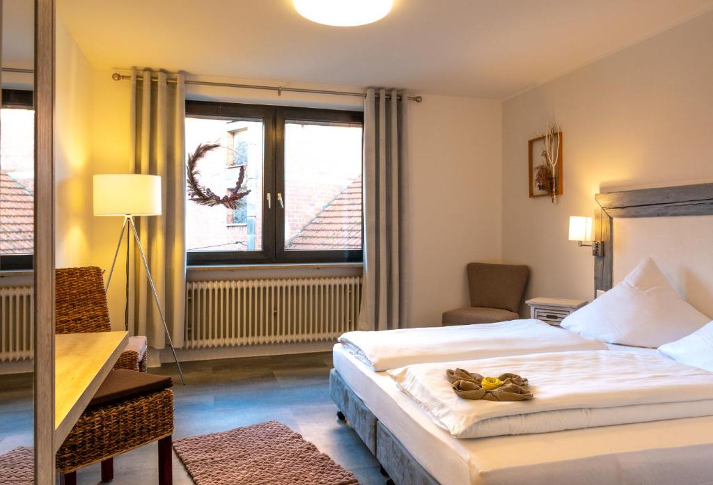 Postel nebo postele na pokoji v ubytování Landgasthof Stricker